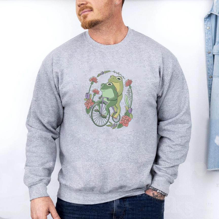 Two Frogs Riding A Bicycle Surrounded By Flowers Sweatshirt